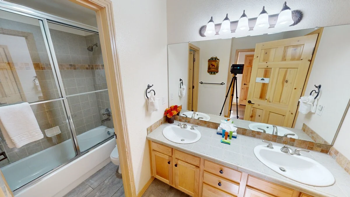 Riverview, double-vanity bathroom, riverfront luxury vacation rental in Silverthorne, Colorado