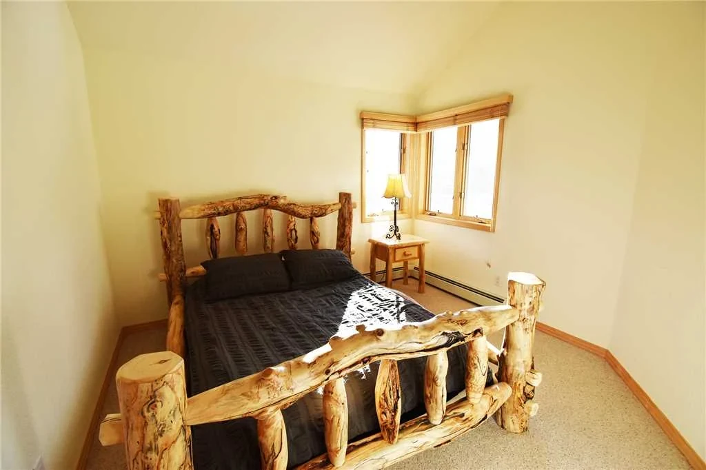 Riverview, upper-level queen bedroom, riverfront luxury vacation rental in Silverthorne, Colorado